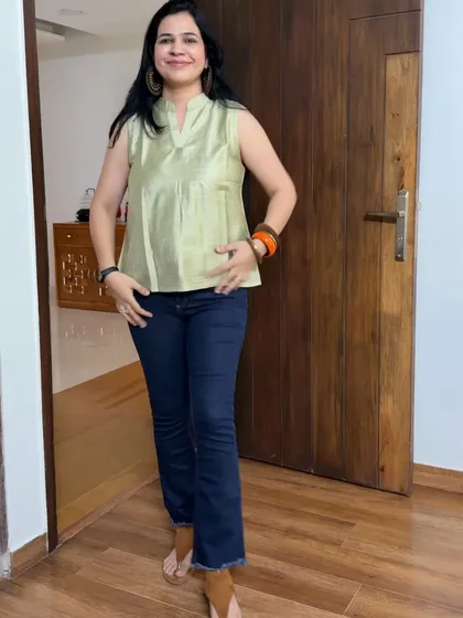 This light green sleeveless top was created from an old dress that I no longer wore. It's a simple way to get a brand new top for your jeans.