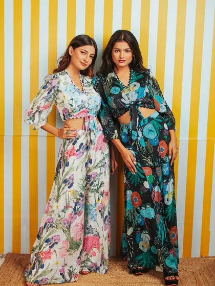 For brand lookbooks, it's about showing the clothes in a relatable way. Here, I shot two models together to create a dynamic scene that highlights these floral co-ord sets for a fashion brand.