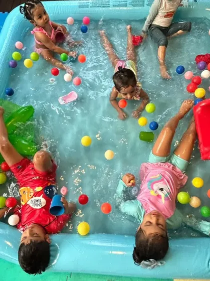 Nothing says summer like a pool full of happy kids! This overhead shot captures the energy of our group water play sessions, where everyone can splash, play, and cool off together.