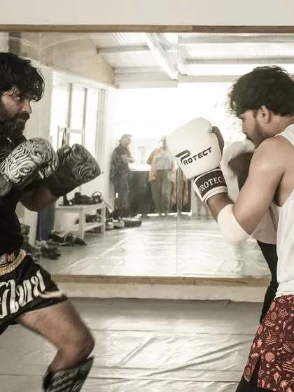 A moment of intense focus during a sparring session. This is where you put your training to the test, learning about distance, timing, and defense in a controlled environment.