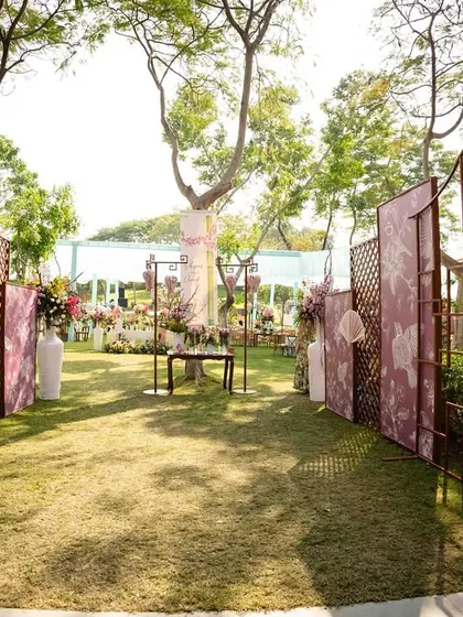 Another view of the entrance to the 'Whispers of the Orient' carnival, showing the custom-printed panels and latticework.