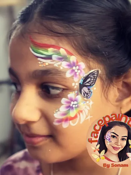 A rainbow arch adds a splash of extra color to this butterfly and flower combination. It’s a cheerful design that’s always a hit at parties.
