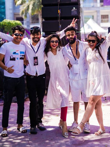 Happy faces at the United Colours of Bangalore Holi festival. It's amazing to see everyone come together to celebrate with music and color.