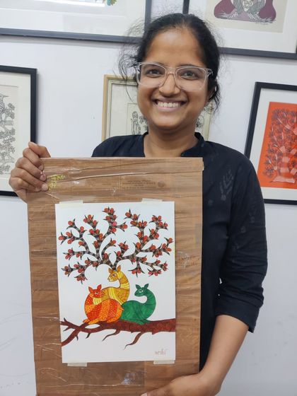 A collection of images from our Gond painting workshop, showing students engaged in the process and their beautiful finished pieces.