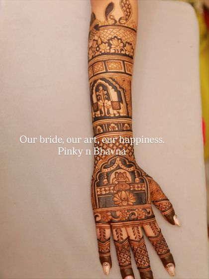 Our bride, our art, our happiness. A close-up of a beautifully executed bridal arm design.