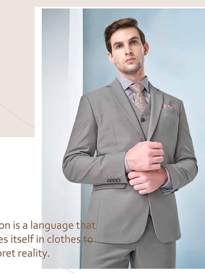 Fashion is a language. This classic grey three-piece suit interprets reality with its clean lines, perfect tailoring, and timeless appeal.