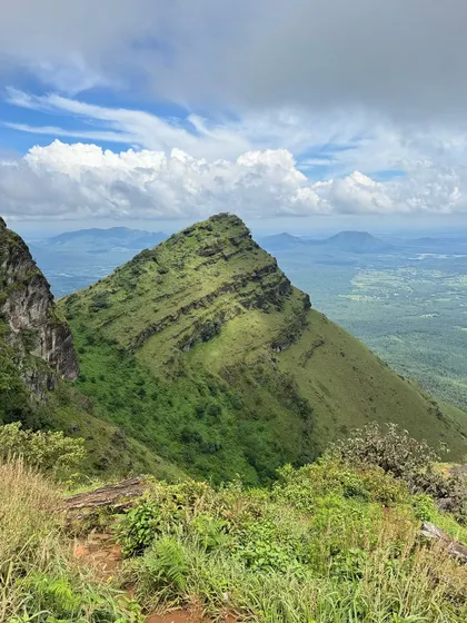 A breathtaking landscape view from our Explore Chikmagalur trip, showing the layered hills and valleys.