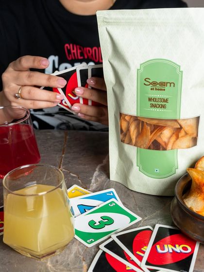 Another shot of the UNO game night, with my Masala Ratalu Chips and refreshing drinks, creating a vibrant and fun atmosphere.
