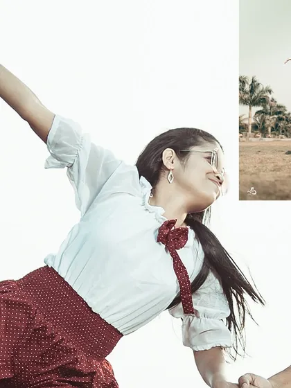 A fun, high-energy shot capturing the bride-to-be in a dynamic pose during their pre-wedding photoshoot.