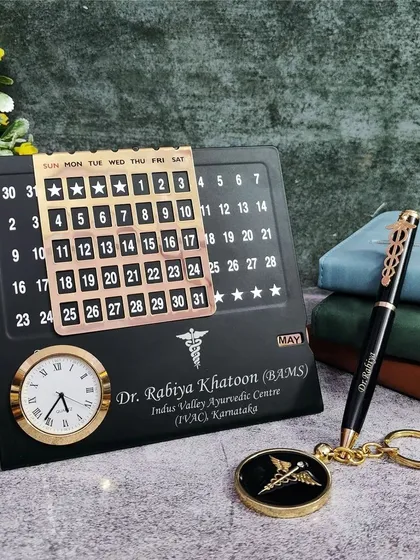 For medical professionals, I offer this Doctor-themed desk set. The metal calendar is engraved with the Caduceus symbol and the doctor's name and credentials, and it comes with a matching pen and keychain.