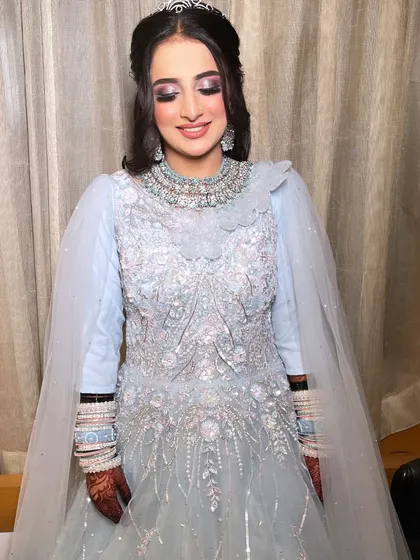 Another shot of this fairytale look. The soft purple eyeshadow and glowing skin complete this dreamy Walima ensemble.