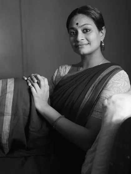 A warm and gentle portrait of Arundhati after her dance practice. The soft window light and her relaxed smile create a beautiful, intimate moment.