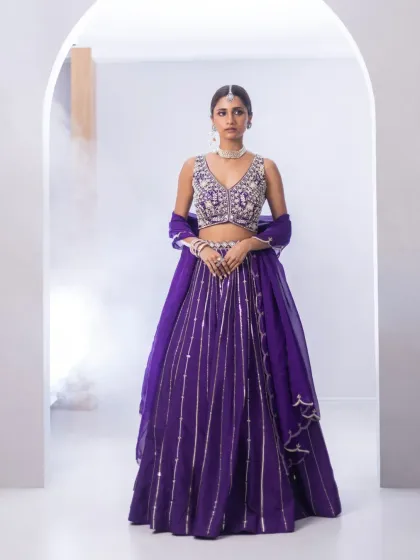 A full view of the purple lehenga, showcasing its vibrant colour and graceful movement. This is a perfect example of how I curate pieces that are joyful, festive, and full of life.
