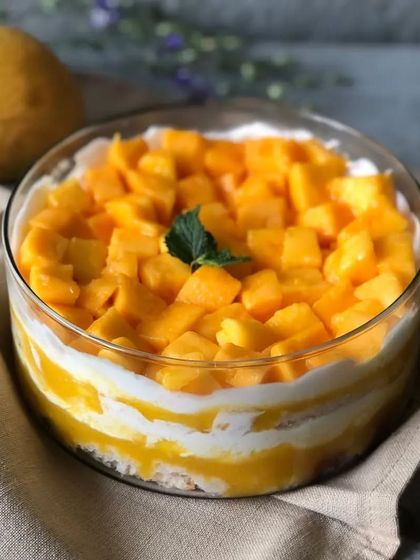 My Mango Cream Cheese Trifle is a summer essential. This bowl is generously layered with fresh mango and light cream.