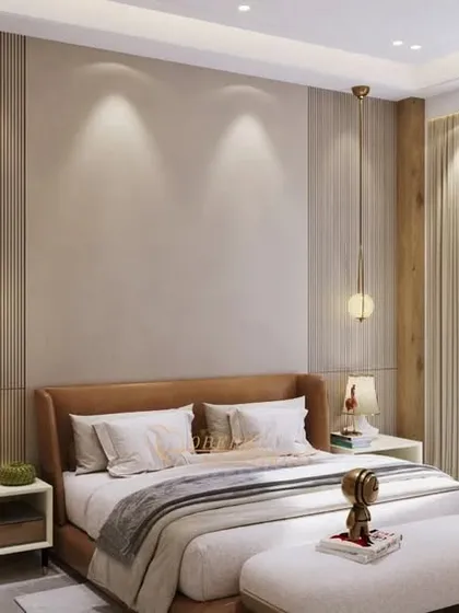 A closer view of the bed and backlit shelving, showcasing the blend of textures and the warm, inviting atmosphere.