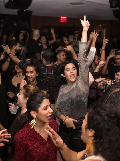 The crowd at the Bolliday Edition, hands up and loving the music. It was the perfect way to dance our way through the holiday season.