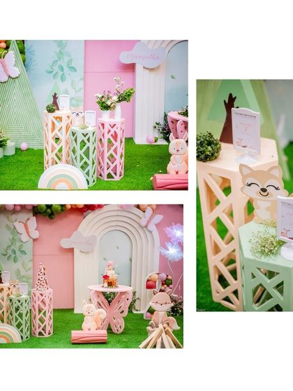 More shots of the woodland creature setup, showcasing the different decorative elements like a butterfly-shaped table, a faux campfire, and friendly animal cutouts.