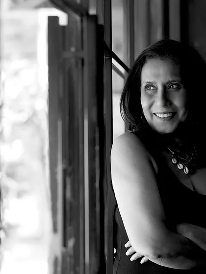 A beautiful black and white portrait of Swaroopa Ghosh by the window. Natural light can create a wonderfully soft and timeless effect.