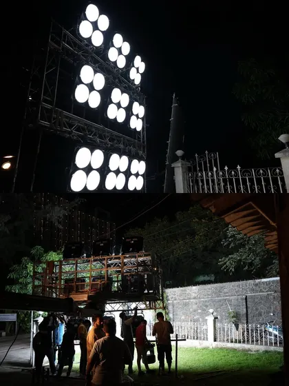 The crew setting up the Filmgear Mega 1200C wall of light for an outdoor night shoot.