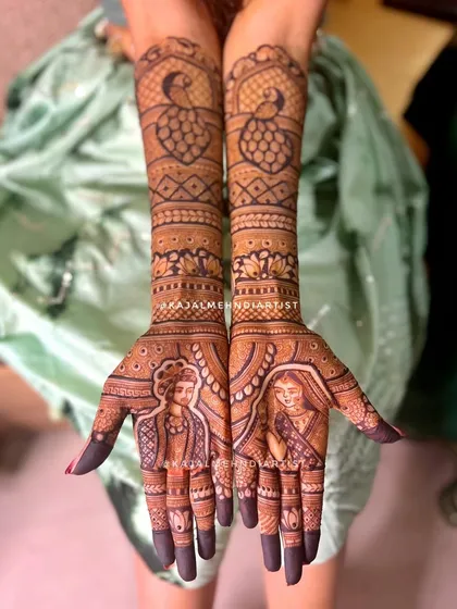 A classic bride and groom portrait, capturing their love forever in henna. I focus on getting the expressions just right, surrounded by beautiful traditional motifs like peacocks and detailed jaal work that extends up the arms for a full, regal look.