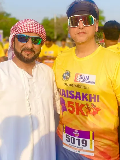 A member with a fellow runner at the Vaisakhi run. The sense of community was incredible.