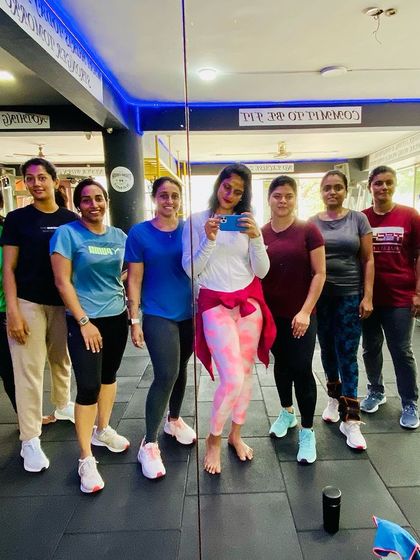 The whole gang in the mirror. It's great to see so many people committed to their health.