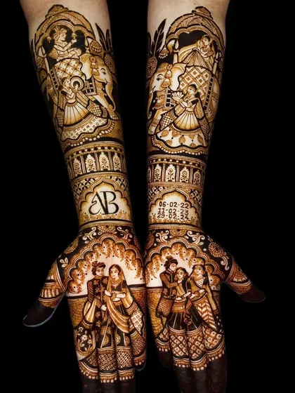 This design is filled with personal touches, including the couple's initials "NB" and their wedding date, surrounded by family portraits and a doli scene.