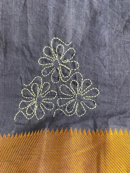 Detail of the floral Sashiko buti. Even with a simple running stitch, it's possible to create beautiful and evocative shapes.