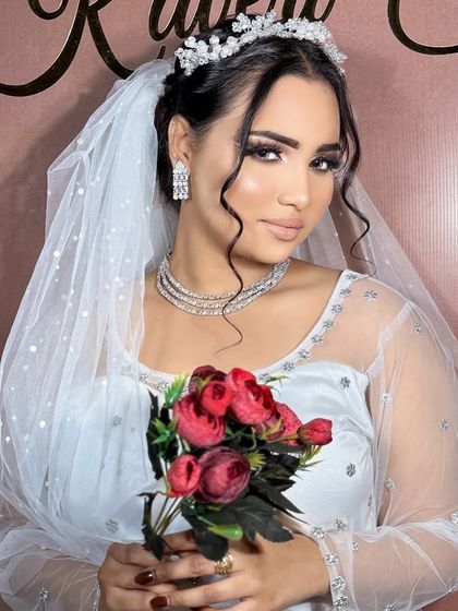 A beautiful portrait of the Christian bride. The soft makeup and simple tiara create a look of pure grace.
