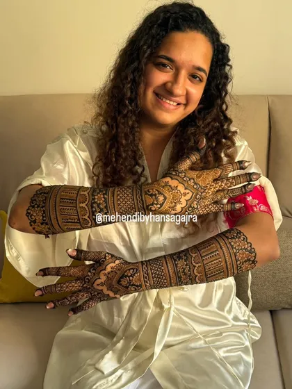 The smile of a happy bride is my greatest achievement. It was a joy to create this full-arm, detailed mehendi for her, ensuring every line was balanced and the final look was as timeless as her celebration.