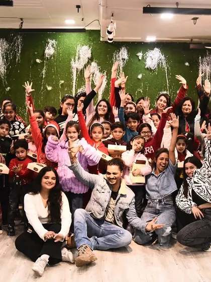 More than just a studio, we are a community. This group photo from our Christmas party captures the joy and friendship that defines our studio, where we celebrate together and build lasting bonds.