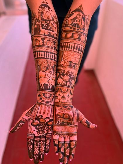 Another angle of the storytelling design, showcasing the intricate details of the deer, cattle, and wedding procession scenes.