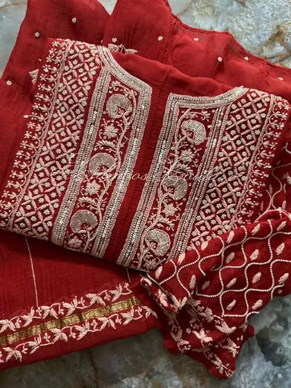 A detailed overhead view of the yoke, perfect for appreciating the craftsmanship of the Kutdana and sequin work.