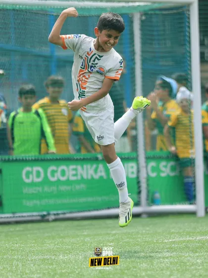 The pure joy of scoring a goal. This moment of celebration is the result of countless hours of practice, teamwork, and determination on the training ground.