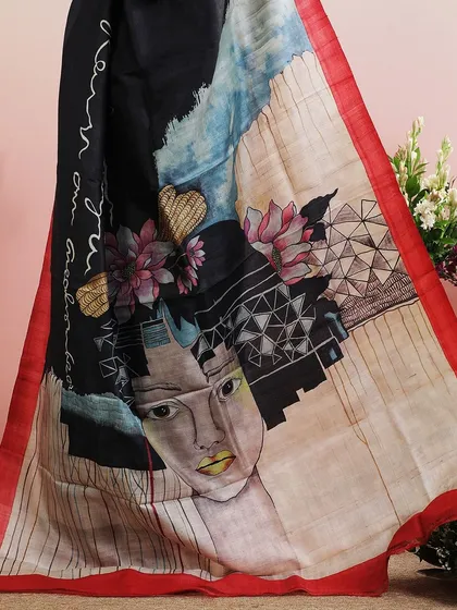 A close-up of the artistic print on the pallu, a beautiful fusion of modern art and traditional drape.