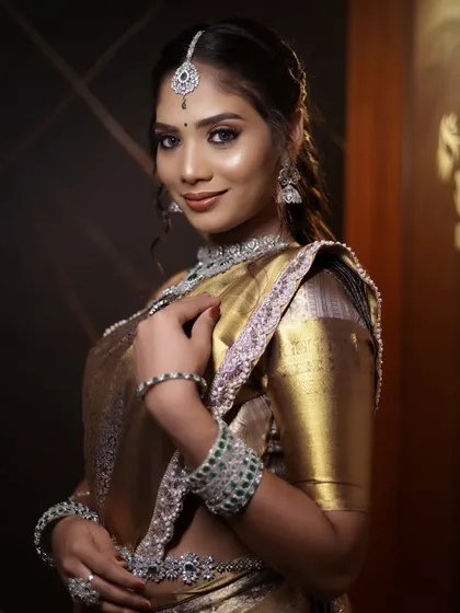 A closer look at the artistry behind a Muhurtham makeover. The focus is on creating a luminous, high-definition finish that looks flawless both in person and on camera, complete with perfectly defined eyes and radiant skin.