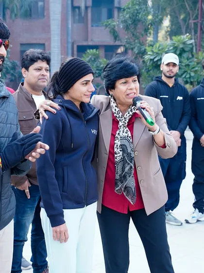 With Dr. Sunita Godara, an Asian Marathon Champion, at the Noida 10K run. I collaborate with legends of the sport to add value and credibility to my events.