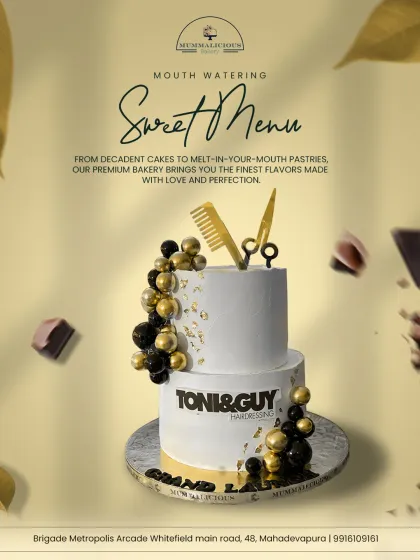 We were thrilled to create this stylish two-tiered cake for the Toni & Guy launch. The black and gold theme with salon tool toppers perfectly captured their brand's chic aesthetic.