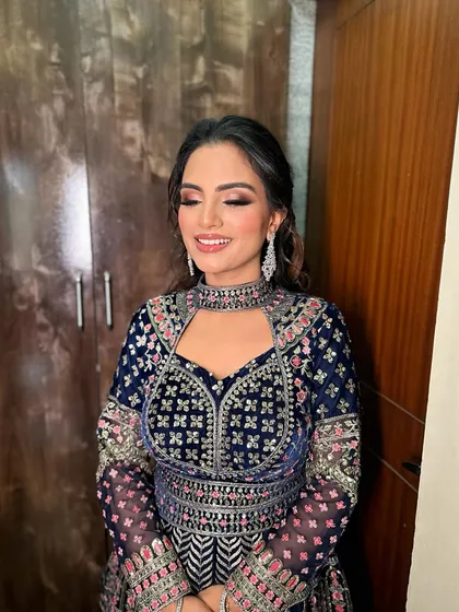 A close-up of Heer's makeup, showing the beautifully blended eyeshadow and radiant skin.