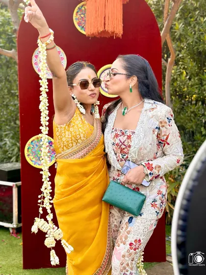 Pouts, kisses, and pure fun at a Haldi celebration. We love capturing these candid moments of friendship and joy that make weddings so special.