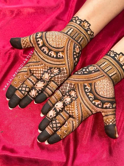 A close-up of the elephant and lotus design for the groom's sister, showing the fine details.