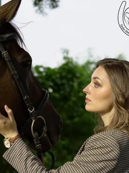 An intimate close-up shot capturing the connection between a person and a horse. The soft lighting and natural background enhance the serene mood.
