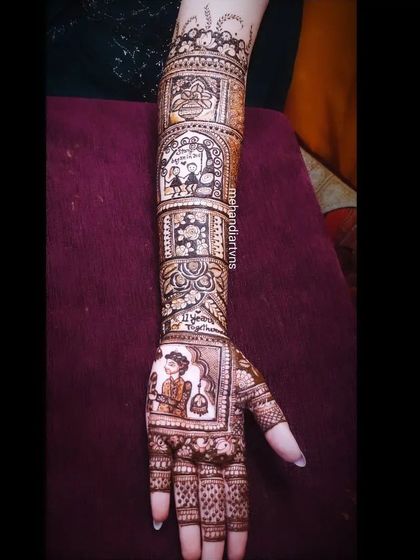 A single arm view of a story-based mehandi. Each panel, from the couple portrait to the floral blocks, contributes to the overall narrative of the design.