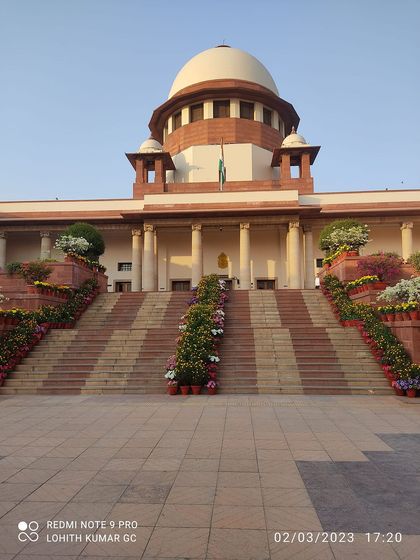 The grand steps of the Supreme Court of India. This building represents the final pillar of justice in our country, and it is a privilege to practice here.