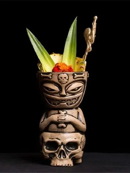 Did you know about Tiki culture? This post delves into the history of this unique style of cocktails, known for exotic flavors, rum bases, and elaborate garnishes like the one shown here.