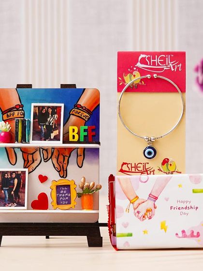 This Friendship Day combo includes a mini easel stand that's also a fridge magnet, a friendship band, and a Kit-Kat chocolate. The stand can be customized with two pictures.