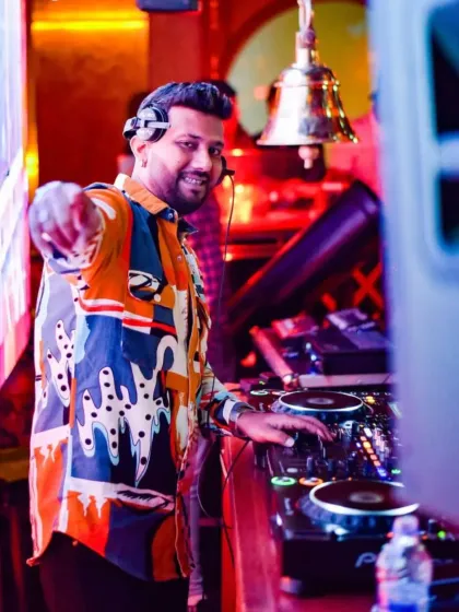 Pointing to the crowd, making a connection. You are the reason I do what I do.