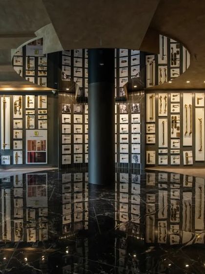 Additional views of the Gala showroom, showcasing the luxurious walk-in closet displays, the reflective marble floor, and the seamless integration of product showcases into the architectural design.