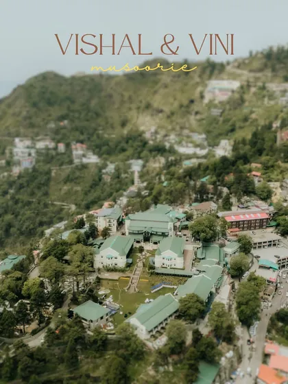 An aerial drone shot establishing the stunning mountain location for this Mehendi ceremony in Mussoorie. It sets the scene for a beautiful celebration surrounded by nature.