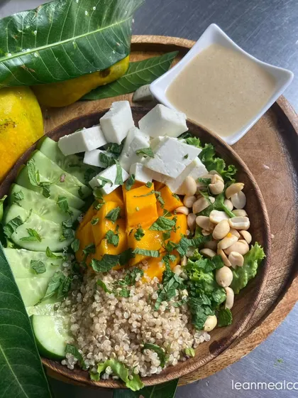 Our seasonal Mango Extravaganza Salad is a celebration of summer. It combines sweet mangoes, creamy feta cheese, crunchy peanuts, and quinoa for a refreshing and balanced meal.